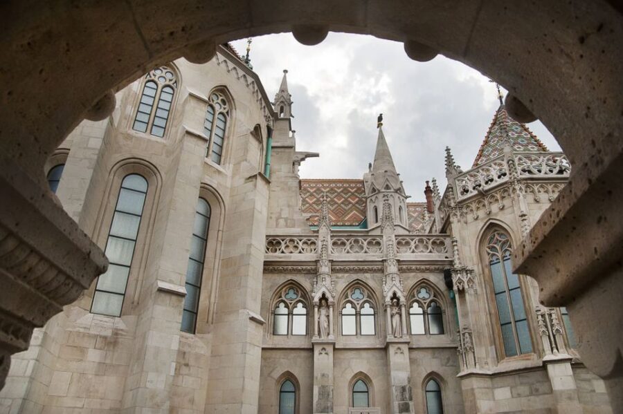 Budapest: Buda Castle Walking Tour in German - Matthias Church and the Gothic walk-by moments
